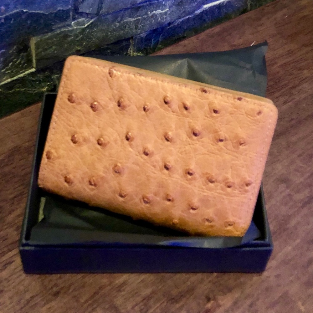 Ostrich leather mini card holder/wallet. New. Never used.New in box.